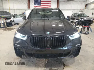 2021 BMW X5 xDrive45e with VIN 5UXTA6C02M9F45757, listed as a Copart auction lot 61991985 with 65,162 mi miles and Salvage title. Bid and sale history available at DreamBid. Image 5.