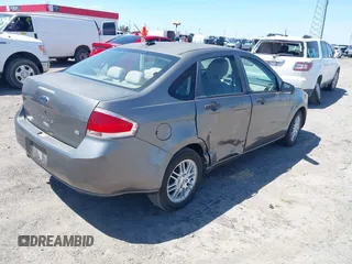 2009 Ford Focus SE with VIN 1FAHP35NX9W108176, listed as a IAAI auction lot 42094209 with 246,714 mi miles. Bid and sale history available at carsss.com. Image 4.