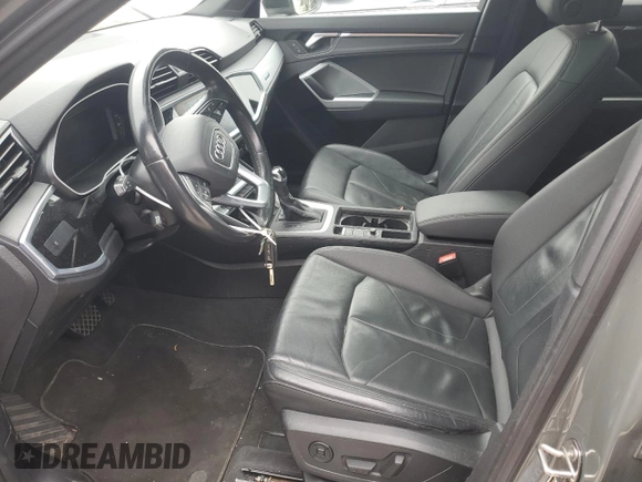 2021 Audi Q3 Premium with VIN WA1AUCF33M1100504, listed as a Copart auction lot 51975165 with 74,054 mi miles and Salvage Title. Bid and sale history available at carsss.com. Image 7.