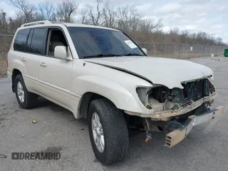 2004 Lexus LX 470 z VIN JTJHT00W743541627, wystawiony jako IAAI lot #41662601 z przebiegiem 244 983 mil mil oraz . Historia ofert i sprzedaży dostępna na DreamBid. Obrazek 1.