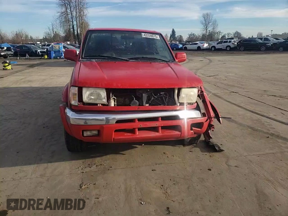 1999 Nissan Frontier XE with VIN 1N6ED26Y2XC312863, listed as a Copart auction lot 42259015 with 212,666 mi miles and Salvage title. Bid and sale history available at DreamBid. Image 11.