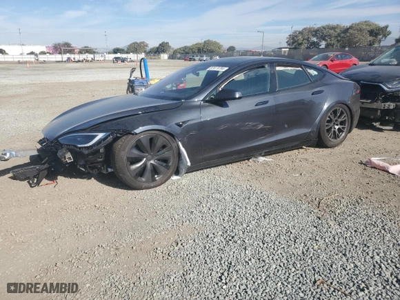2024 Tesla Model S with VIN 5YJSA1E57RF545269, listed as a Copart auction lot 87419784 with 0 mi miles and Salvage Title. Bid and sale history available at carsss.com. Image 1.