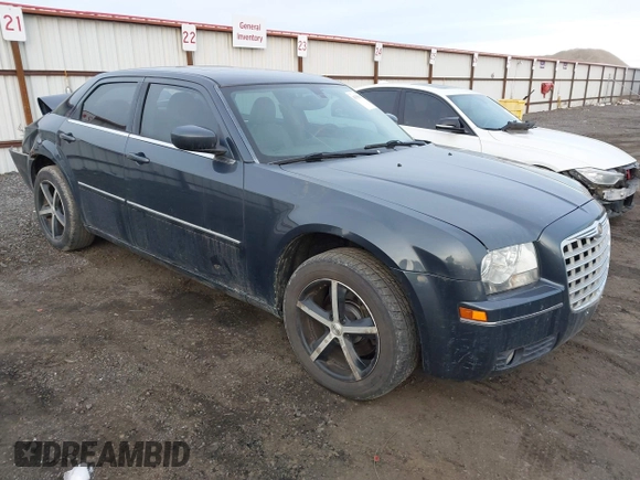 2007 Chrysler 300 Touring with VIN 2C3LK53G27H882957, listed as a IAAI auction lot 41350117 with 214,055 mi miles. Bid and sale history available at carsss.com. Image 1.
