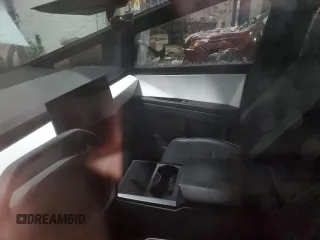 2024 Tesla Cybertruck z VIN 7G2CEHED7RA019582, wystawiony jako Copart lot #87906725 z przebiegiem Nie podano mil oraz Szkoda całkowita • Salvage title. Historia ofert i sprzedaży dostępna na DreamBid. Obrazek 9.