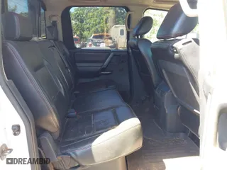 2010 Nissan Titan SE with VIN 1N6AA0EC1AN306419, listed as a IAAI auction lot 41658404 with 114,770 mi miles. Bid and sale history available at carsss.com. Image 8.