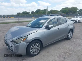 2016 Scion iA z VIN 3MYDLBZV4GY133476, wystawiony jako IAAI lot #42115431 z przebiegiem 112 087 mil mil oraz . Historia ofert i sprzedaży dostępna na DreamBid. Obrazek 17.