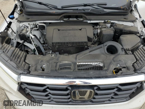 2024 Honda Pilot Touring z VIN 5FNYG2H74RB011187, wystawiony jako Copart lot #79999324 z przebiegiem 16 123 mil mil oraz Szkoda całkowita • Salvage title. Historia ofert i sprzedaży dostępna na DreamBid. Obrazek 12.