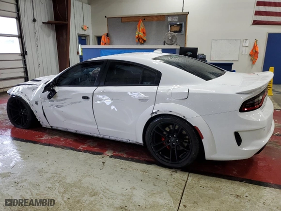 2021 Dodge Charger SRT Hellcat Redeye Widebody with VIN 2C3CDXL95MH658861, listed as a Copart auction lot 87414834 with 49,138 mi miles and Salvage Title. Bid and sale history available at carsss.com. Image 2.