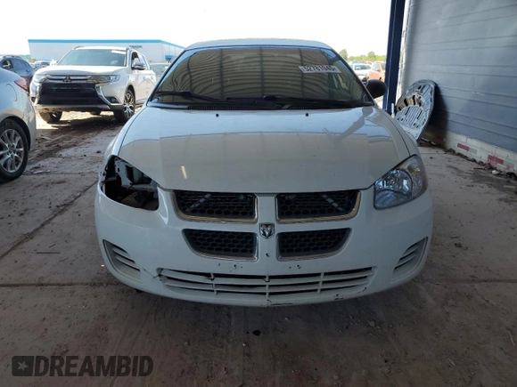 2005 Dodge Stratus SXT z VIN 1B3EL46XX5N601131, wystawiony jako Copart lot #52781045 z przebiegiem 129 089 mil mil oraz Szkoda całkowita • Salvage title. Historia ofert i sprzedaży dostępna na DreamBid. Obrazek 5.