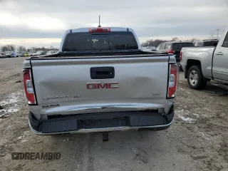 2019 GMC Canyon 4WD SLT with VIN 1GTG6DEN7K1134168, listed as a Copart auction lot 86510834 with 61,889 mi miles and Salvage Title. Bid and sale history available at carsss.com. Image 6.