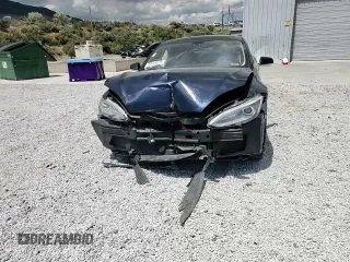 2014 Tesla Model S 60 with VIN 5YJSA1S12EFP29885, listed as a Copart auction lot 59769215 with Not provided miles and Salvage title. Bid and sale history available at DreamBid. Image 13.