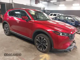 2023 Mazda CX-5 2.5 S Premium Plus Package with VIN JM3KFBEM5P0164568, listed as a IAAI auction lot 41843961 with 22,891 mi miles. Bid and sale history available at carsss.com. Image 1.