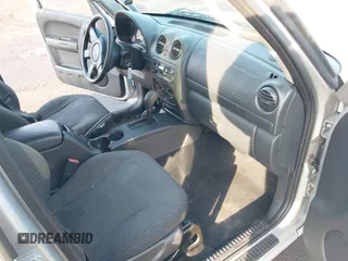 2002 Jeep Liberty Sport with VIN 1J4GL48K32W131467, listed as a IAAI auction lot 41485096 with 139,407 mi miles. Bid and sale history available at carsss.com. Image 5.