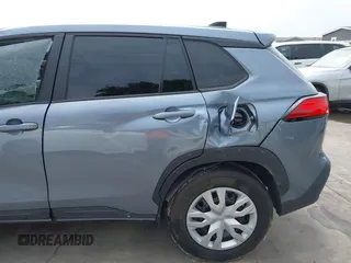 2023 Toyota Corolla Cross L with VIN 7MUAAAAG9PV047205, listed as a IAAI auction lot 41898077 with 29,184 mi miles and . Bid and sale history available at DreamBid. Image 13.