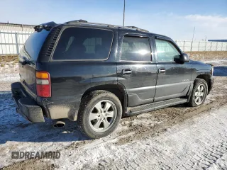 2001 GMC Yukon Denali с VIN 1GKEK63U01J253479, выставлен на аукционе Copart как лот 83272054 с пробегом 217 364 миль миль и Чистый • Clean title. История ставок и продаж доступна на DreamBid. Изображение 3.