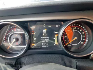 2019 Jeep Wrangler Unlimited Sahara z VIN 1C4HJXEG3KW635681, wystawiony jako Copart lot #60734065 z przebiegiem 75 020 mil mil oraz Szkoda całkowita • Salvage title. Historia ofert i sprzedaży dostępna na DreamBid. Obrazek 9.