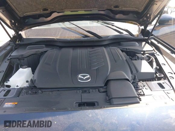 2024 Mazda CX-90 Premium Plus with VIN JM3KKEHD8R1186750, listed as a IAAI auction lot 41795353 with 5,144 mi miles and . Bid and sale history available at DreamBid. Image 10.