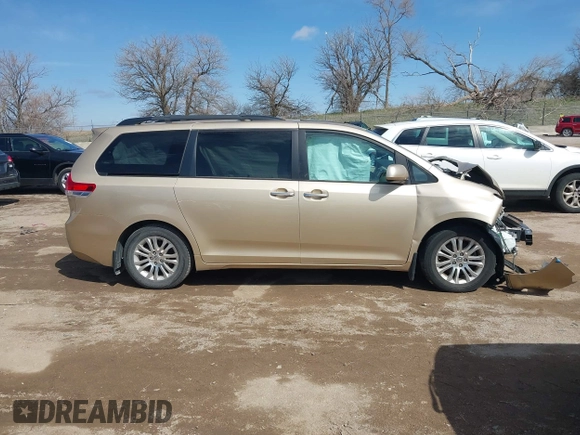 2012 Toyota Sienna XLE AAS with VIN 5TDYK3DC0CS202891, listed as a IAAI auction lot 41938594 with Not Provided miles and . Bid and sale history available at carsss.com. Image 14.