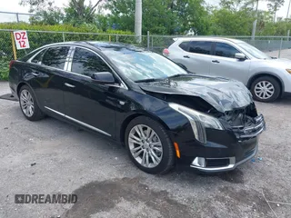 2019 Cadillac XTS Luxury with VIN 2G61M5S33K9115359, listed as a IAAI auction lot 42612026 with 246,165 mi miles and . Bid and sale history available at DreamBid. Image 1.