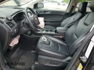 2020 Ford Edge Titanium с VIN 2FMPK3K93LBB56277, выставлен на аукционе Copart как лот 57502985 с пробегом 80 352 миль миль и Списание • Salvage title. История ставок и продаж доступна на DreamBid. Изображение 7.