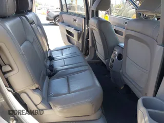 2013 Honda Pilot Touring with VIN 5FNYF3H94DB024069, listed as a IAAI auction lot 42638568 with 190,326 mi miles and . Bid and sale history available at DreamBid. Image 8.