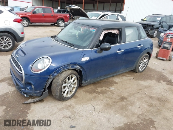2017 MINI Hardtop 4 Door Cooper S z VIN WMWXU3C3XH2F49313, wystawiony jako IAAI lot #42137594 z przebiegiem 87 865 mil mil oraz . Historia ofert i sprzedaży dostępna na DreamBid. Obrazek 16.