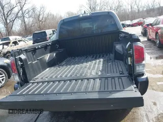 2021 Toyota Tacoma SR z VIN 3TMCZ5AN0MM392247, wystawiony jako IAAI lot #41645989 z przebiegiem 48 029 mil mil oraz . Historia ofert i sprzedaży dostępna na DreamBid. Obrazek 12.