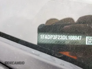 2013 Ford Focus SE z VIN 1FADP3F23DL108047, wystawiony jako Copart lot #57450795 z przebiegiem 67 518 mil mil oraz Szkoda całkowita • Salvage title. Historia ofert i sprzedaży dostępna na DreamBid. Obrazek 12.