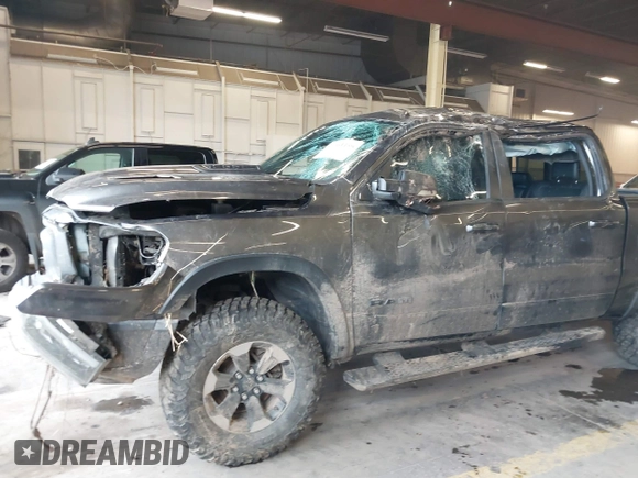 2020 Ram 1500 Rebel with VIN 1C6SRFLT0LN162491, listed as a IAAI auction lot 41841159 with 58,265 mi miles and . Bid and sale history available at DreamBid. Image 6.