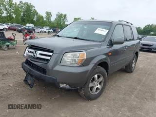 2007 Honda Pilot EX-L z VIN 2HKYF18587H511816, wystawiony jako IAAI lot #42366623 z przebiegiem 170 866 mil mil oraz . Historia ofert i sprzedaży dostępna na DreamBid. Obrazek 17.