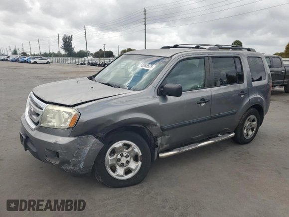 2009 Honda Pilot LX with VIN 5FNYF382X9B028461, listed as a Copart auction lot 52068575 with 189,267 mi miles and Salvage title. Bid and sale history available at DreamBid. Image 1.