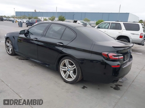 2014 BMW 5 Series 535d with VIN WBAXA5C59ED690375, listed as a IAAI auction lot 42030902 with 70,553 mi miles and . Bid and sale history available at carsss.com. Image 3.
