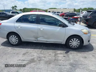 2010 Toyota Yaris with VIN JTDBT4K30A4067769, listed as a IAAI auction lot 42072347 with 266,213 mi miles. Bid and sale history available at carsss.com. Image 6.