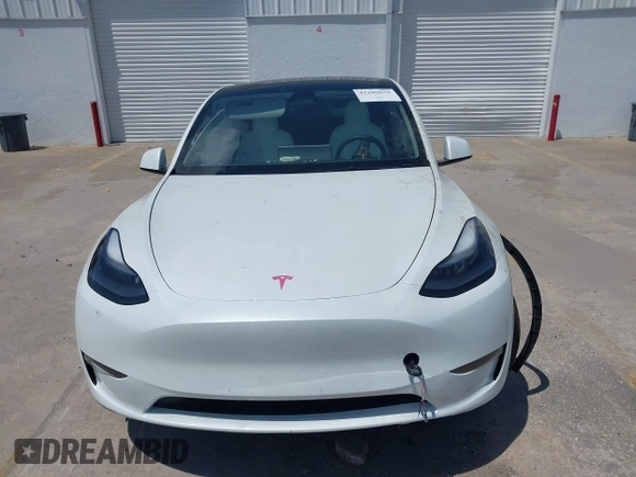 2023 Tesla Model Y Long Range with VIN 7SAYGDEE7PF865539, listed as a IAAI auction lot 42109673 with 34,923 mi miles and . Bid and sale history available at DreamBid. Image 12.