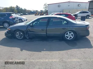 2003 Pontiac Bonneville SE z VIN 1G2HX52K934181238, wystawiony jako IAAI lot #41483636 z przebiegiem 176 737 mil mil oraz . Historia ofert i sprzedaży dostępna na DreamBid. Obrazek 14.