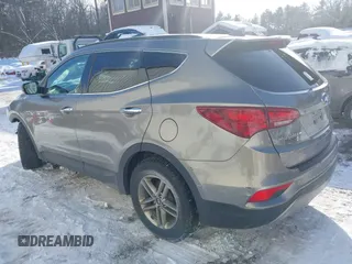 2017 Hyundai Santa Fe 2.4L with VIN 5NMZUDLB4HH034437, listed as a IAAI auction lot 41565545 with 96,640 mi miles and . Bid and sale history available at DreamBid. Image 3.