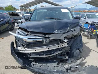 2020 Honda Ridgeline RTL with VIN 5FPYK3F53LB030107, listed as a IAAI auction lot 41933517 with 93,373 mi miles and . Bid and sale history available at DreamBid. Image 12.