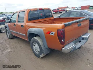 2005 Chevrolet Colorado 1SF LS Z71 with VIN 1GCDT136858153121, listed as a IAAI auction lot 41915498 with 195,131 mi miles. Bid and sale history available at carsss.com. Image 3.