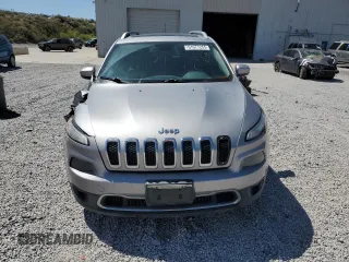 2014 Jeep Cherokee Limited z VIN 1C4PJMDB7EW173601, wystawiony jako Copart lot #61677255 z przebiegiem 180 446 mil mil oraz Szkoda całkowita • Salvage title. Historia ofert i sprzedaży dostępna na DreamBid. Obrazek 5.