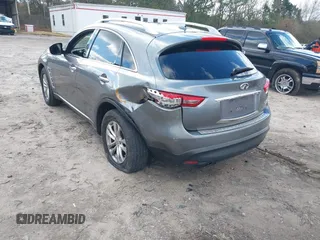 2015 Infiniti QX70 with VIN JN8CS1MWXFM480906, listed as a IAAI auction lot 41177811 with 176,527 mi miles and . Bid and sale history available at DreamBid. Image 3.