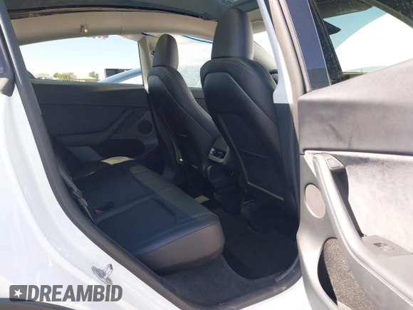 2024 Tesla Model Y Performance with VIN 7SAYGDEF4RF053711, listed as a IAAI auction lot 41836931 with 12,442 mi miles and . Bid and sale history available at DreamBid. Image 8.