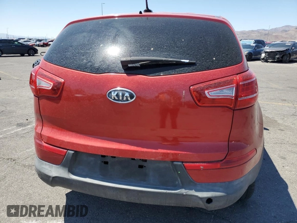 2012 Kia Sportage LX with VIN KNDPB3A25C7345952, listed as a Copart auction lot 57830015 with 101,757 mi miles and Salvage title. Bid and sale history available at DreamBid. Image 6.