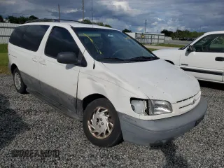 2000 Toyota Sienna CE with VIN 4T3GF19C0YU294779, listed as a Copart auction lot 74715024 with 164,664 mi miles and Salvage Title. Bid and sale history available at carsss.com. Image 4.