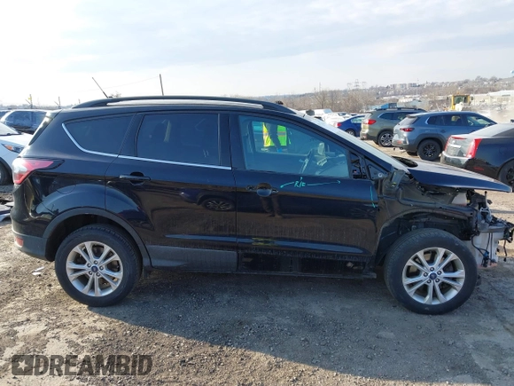 2018 Ford Escape SE z VIN 1FMCU9GD9JUC25456, wystawiony jako IAAI lot #41721436 z przebiegiem 55 642 mil mil oraz . Historia ofert i sprzedaży dostępna na DreamBid. Obrazek 14.