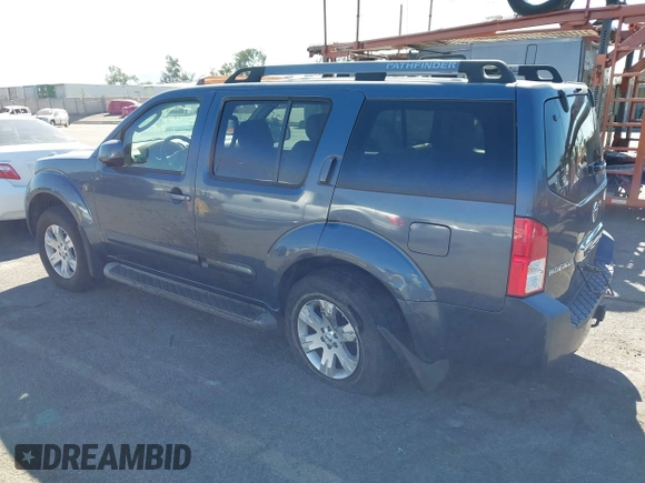 2005 Nissan Pathfinder SE with VIN 5N1AR18U05C741080, listed as a IAAI auction lot 40671277 with 215,693 mi miles. Bid and sale history available at carsss.com. Image 3.