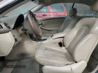 2004 Mercedes-Benz CLK 320 z VIN WDBTJ65JX4F102602, wystawiony jako Copart lot #48133485 z przebiegiem 143 166 mil mil oraz Szkoda całkowita • Salvage title. Historia ofert i sprzedaży dostępna na DreamBid. Obrazek 7.