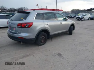 2013 Mazda CX-9 Grand Touring z VIN JM3TB3DV1D0401102, wystawiony jako IAAI lot #41248346 z przebiegiem 122 555 mil mil oraz . Historia ofert i sprzedaży dostępna na DreamBid. Obrazek 4.