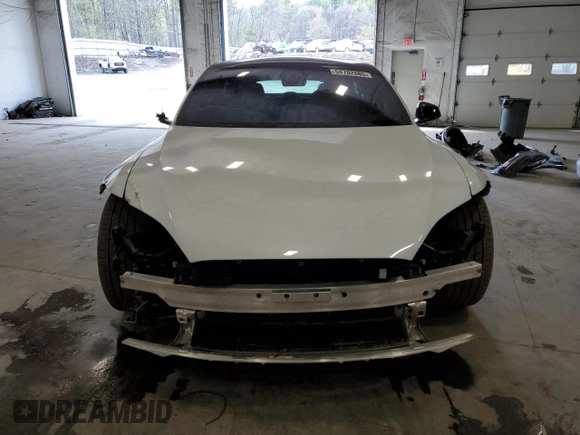 2024 Tesla Model S with VIN 5YJSA1E56RF538488, listed as a Copart auction lot 54702885 with 9,470 mi miles and Salvage title. Bid and sale history available at DreamBid. Image 5.