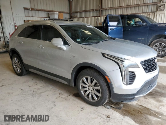 2019 Cadillac XT4 FWD Premium Luxury with VIN 1GYFZCR46KF198424, listed as a Copart auction lot 55465185 with 84,706 mi miles and Salvage title. Bid and sale history available at DreamBid. Image 4.