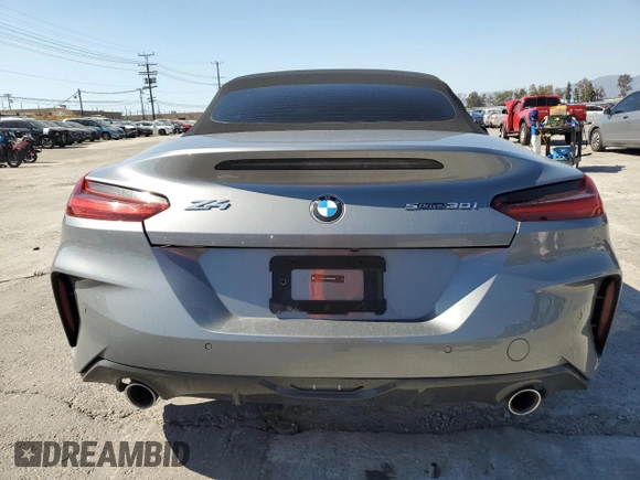 2024 BMW Z4 sDrive30i with VIN WBAHF3C06RWY36286, listed as a Copart auction lot 50296565 with 9,898 mi miles and Salvage title. Bid and sale history available at DreamBid. Image 6.